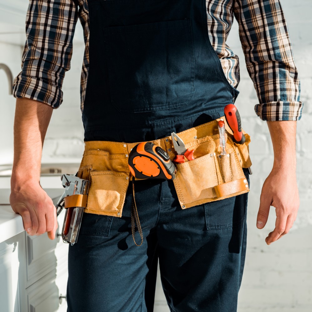 cropped view of installer with tool belt standing 2023 11 27 05 10 49 square